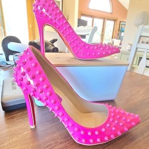 Neon pink spiked Katy perry heels